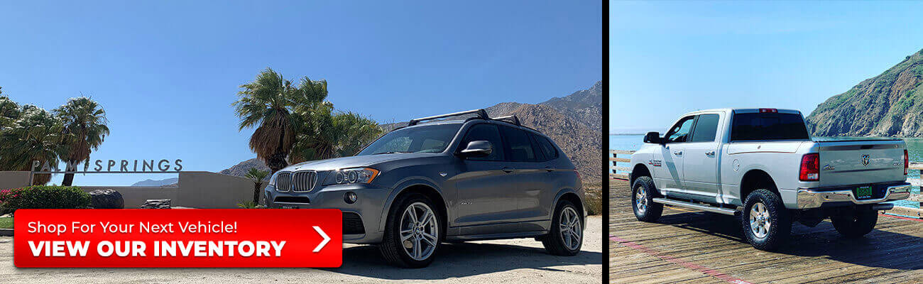 A BMW SUV near Long Beach and a Dodge Ram pickup parked on a pier.