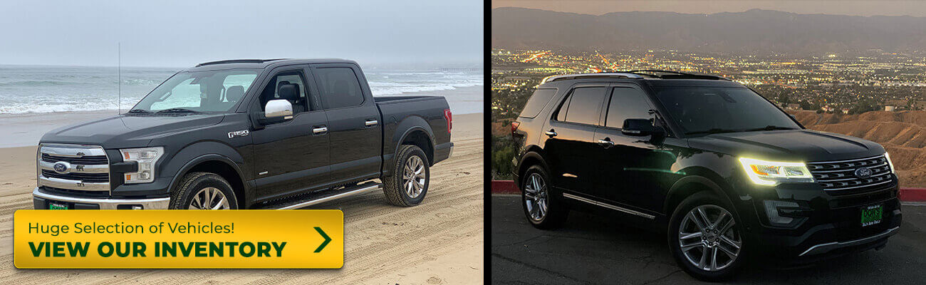 A Ford pickup truck on the beach and a Ford SUV overlooking a valley.